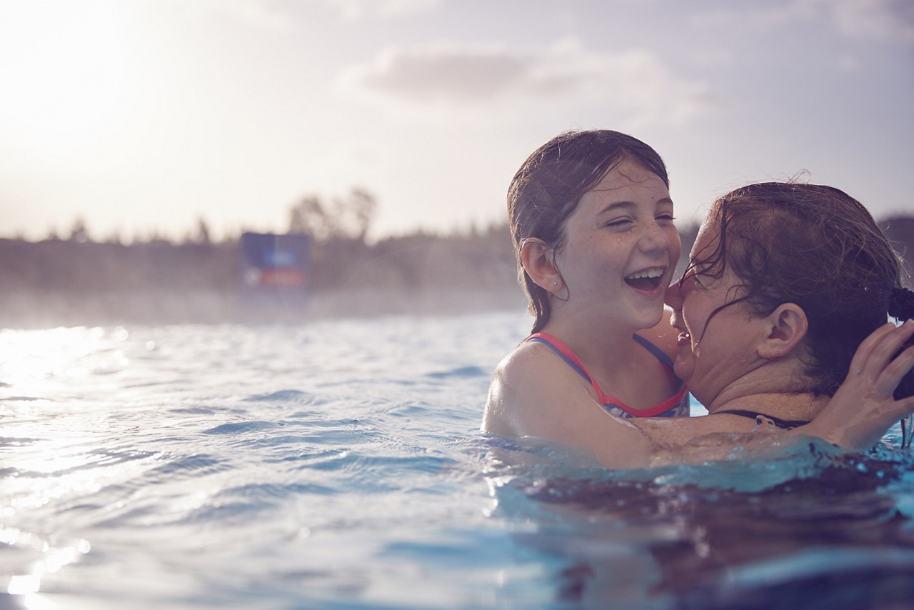 A girl with her mother in the Subtropical Swimming Paradise 