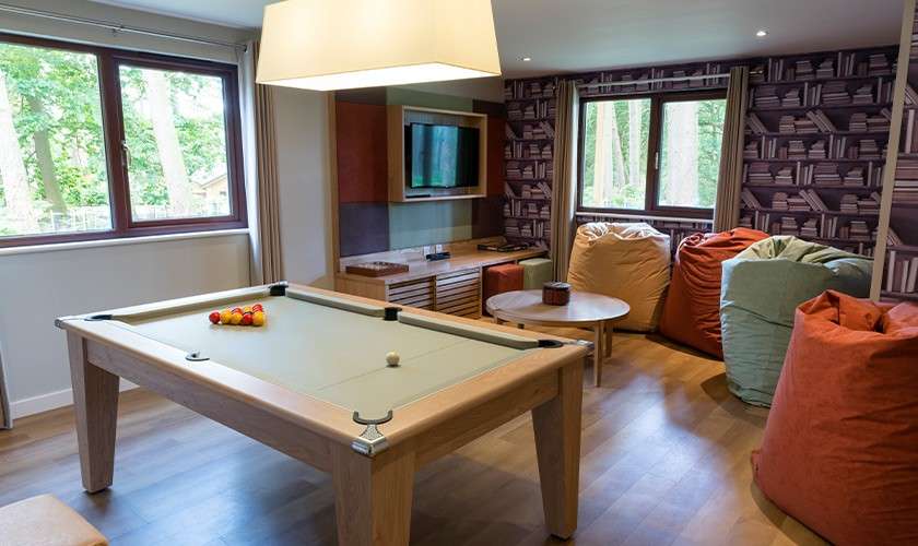 The games room inside of an Exclusive Lodge.