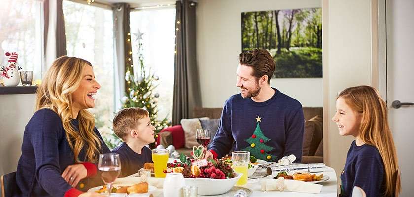 A family enjoying a festive dinner