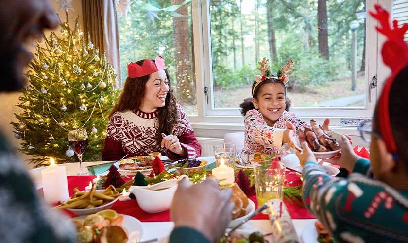 A family enjoying a festive dinner