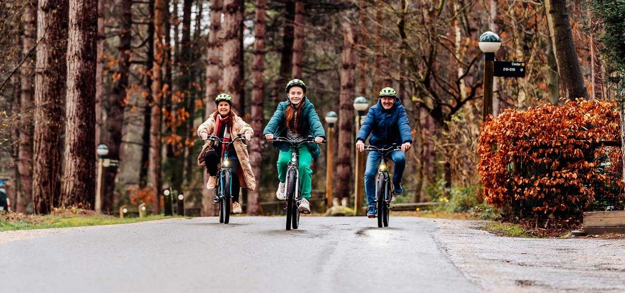A family cycling on the path.