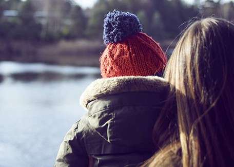 A little girl dressed as a witch