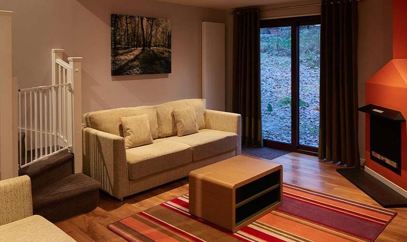 A lodge living area showing a baby gate