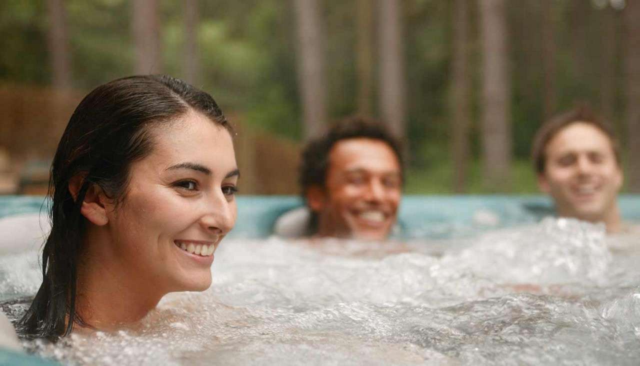 Family in a hot tub together