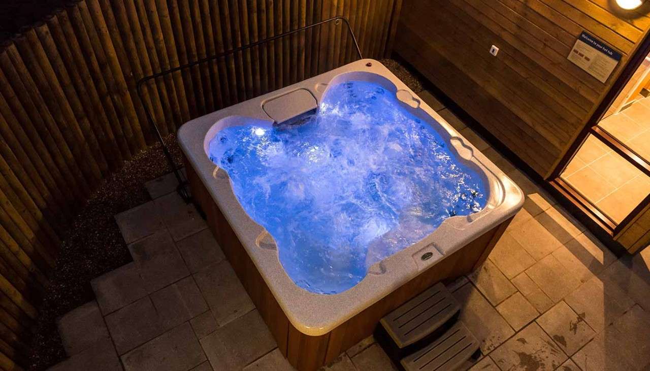 Bubbling hot tub at night