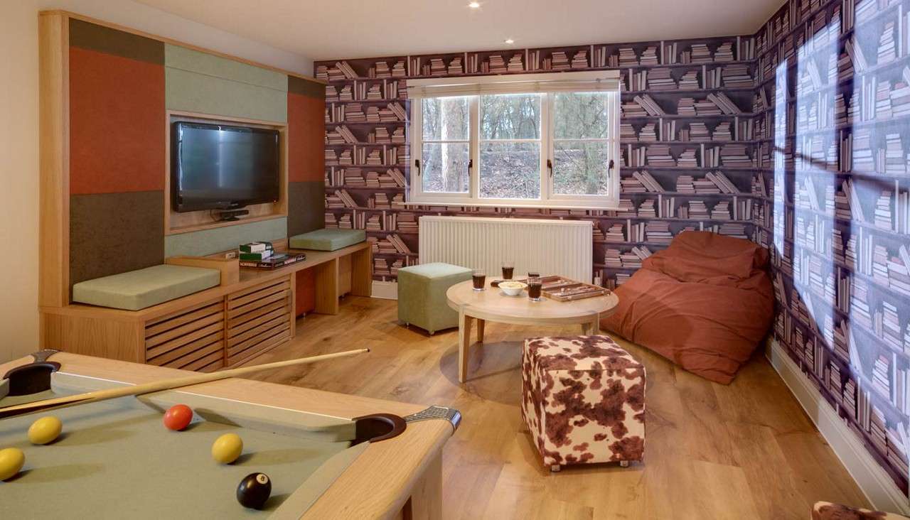 A hot tub and sauna outside an Exclusive Lodge