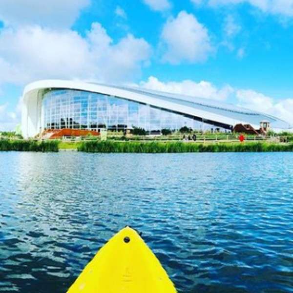 A kayak on the lake facing Longford village