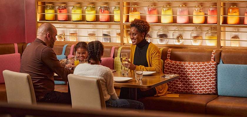A family eating at a restaurant.