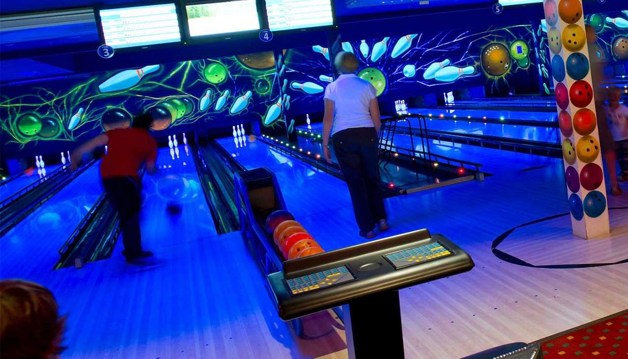 Family playing bowling 