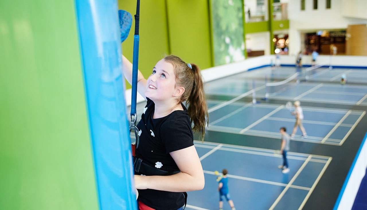 Girl on Indoor Climbing Adventure