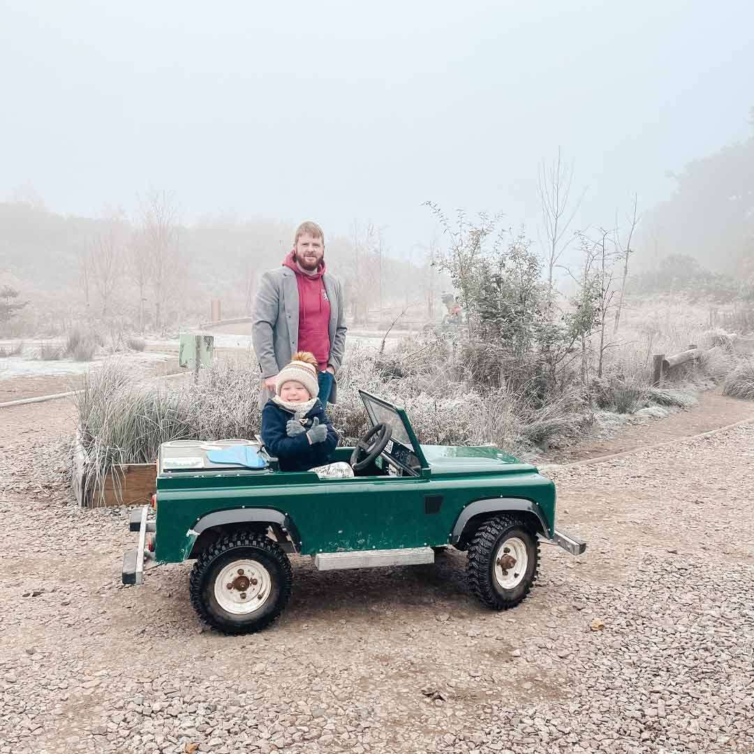 Young child in a mini Off Road Explorer vehicle