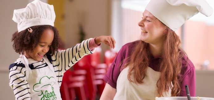 Young girl making some tasty treats in Chocolate Chefs Academy