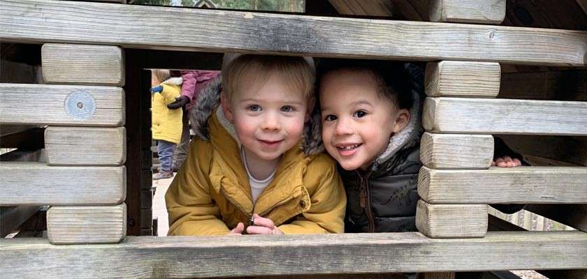 2 boys at the outdoor play area