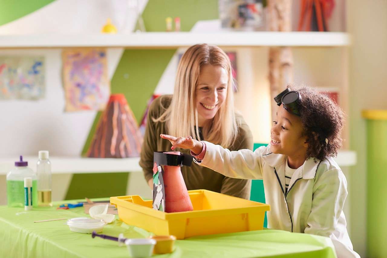Young person doing some Crazy Science with an adult.