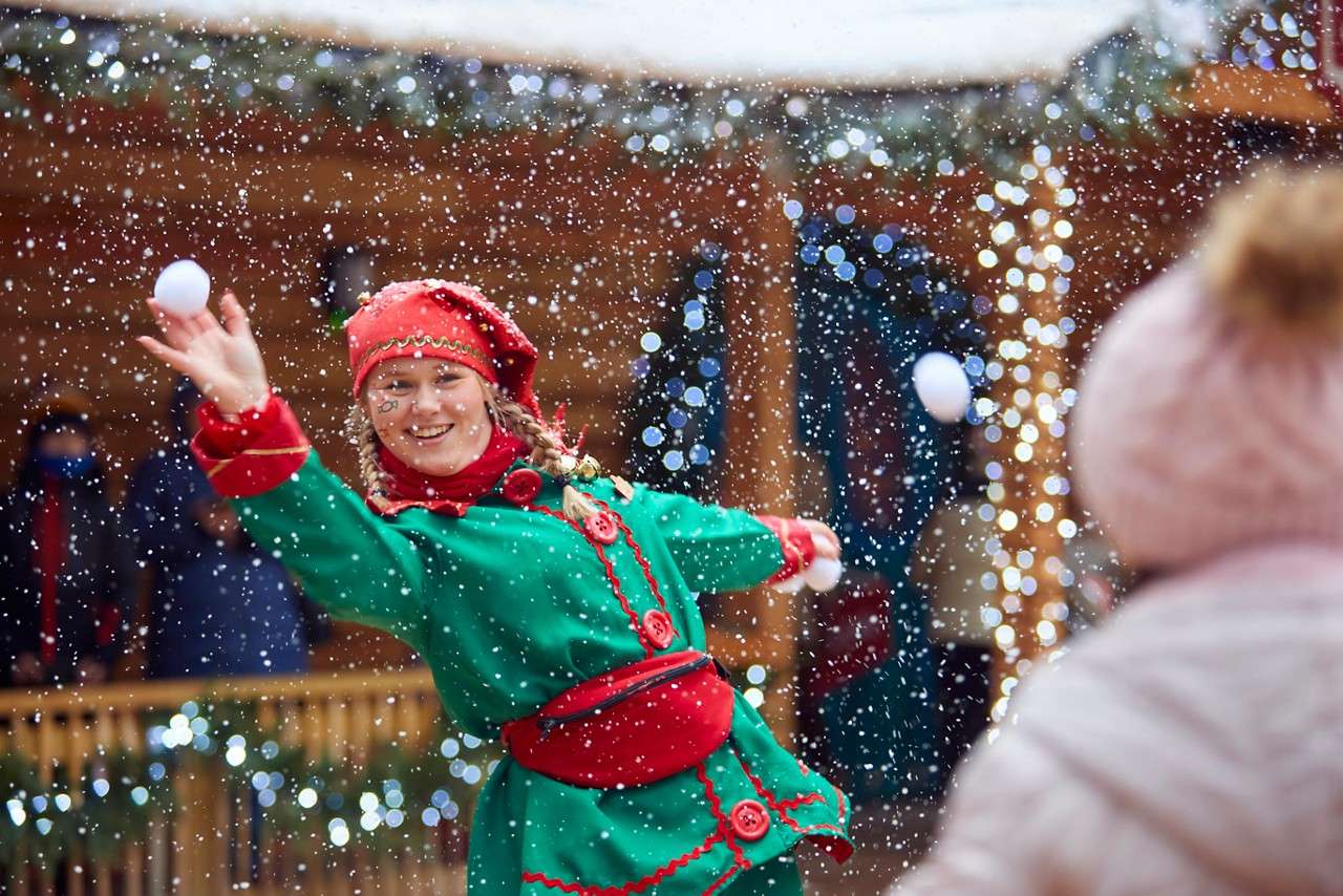 Elf throwing a snowball.