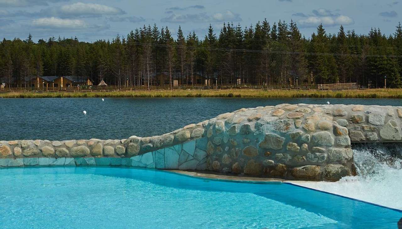 Outdoor pool with view of the lake
