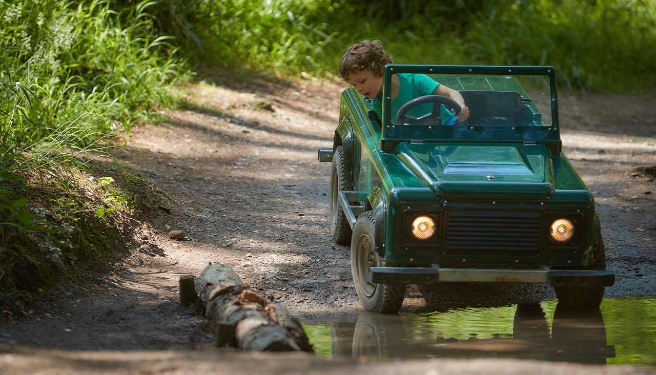 A child in a small car 