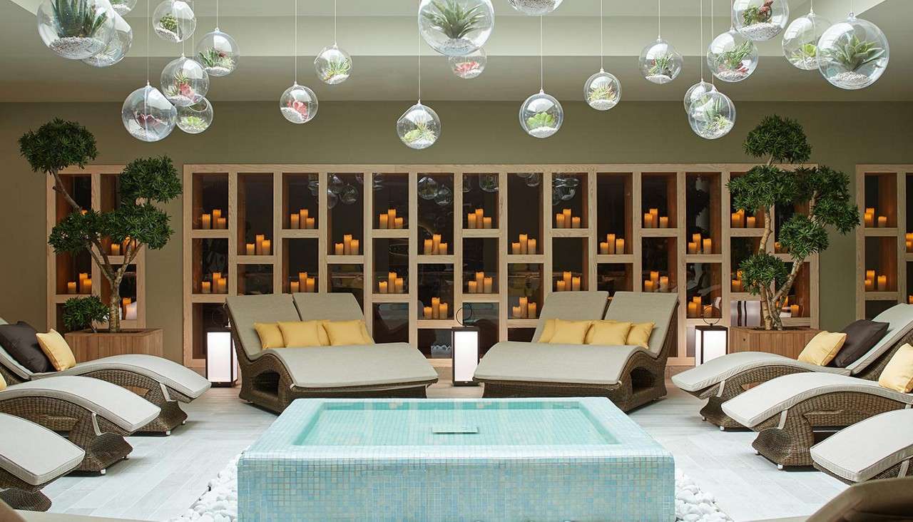 Forest Garden, padded loungers facing a calming water feature.