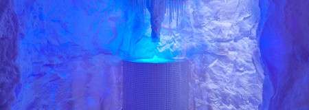 Ice cave with hanging icicles.