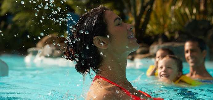 A woman swims in the Subtropical Swimming Paradise