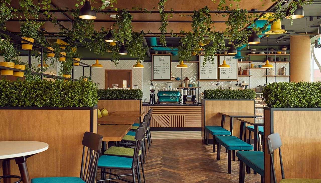 Chairs and tables inside The Coffee House