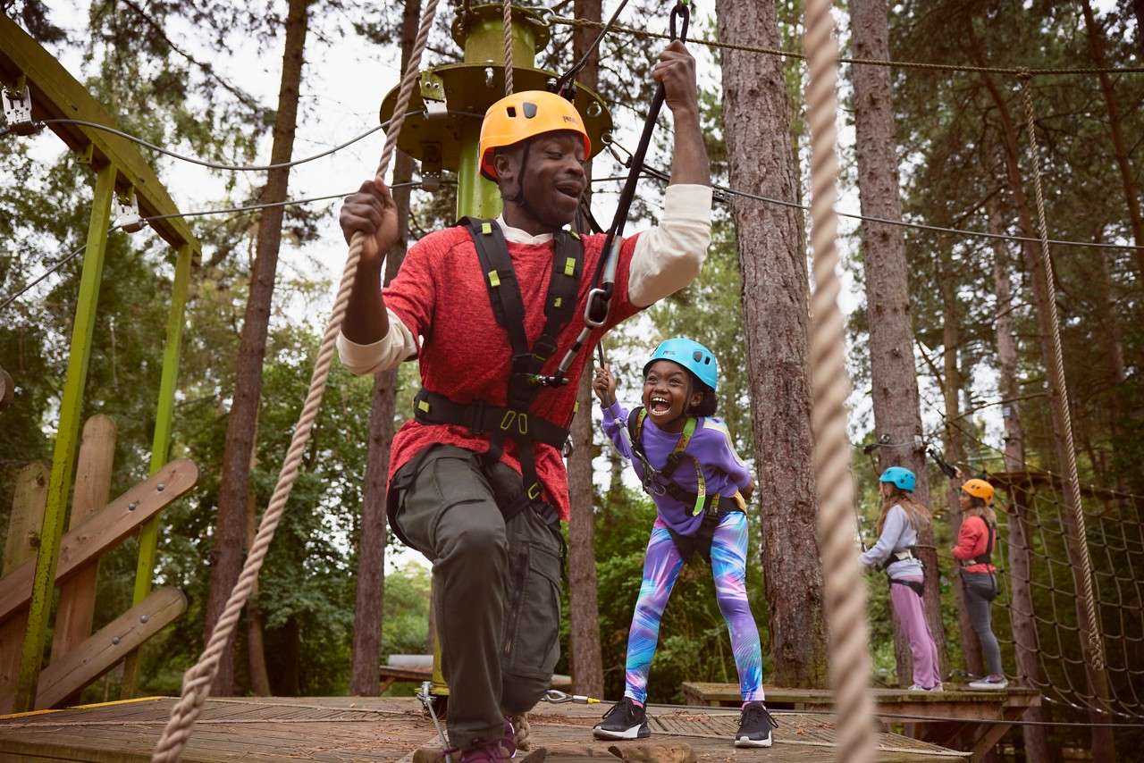 Children walking along a bridge during the Ariel Adventure.