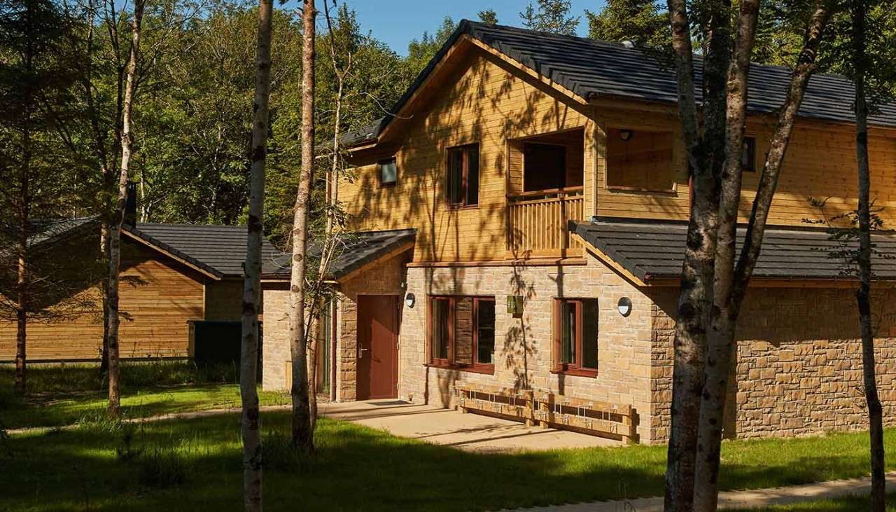 Two-storey Executive Lodge surrounded by forest