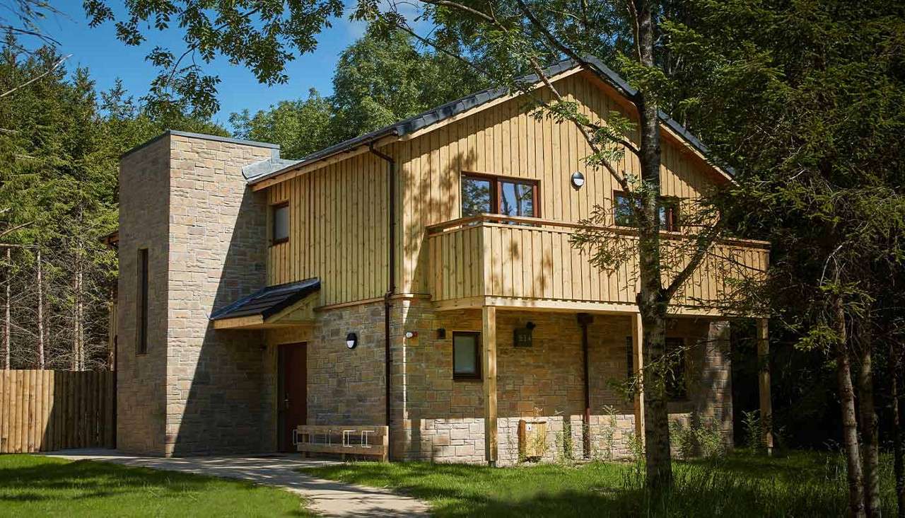 The exterior of an Forest Lodge in the forest