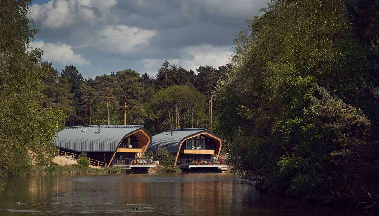 The exterior of two Waterside Lodges facing the lake 