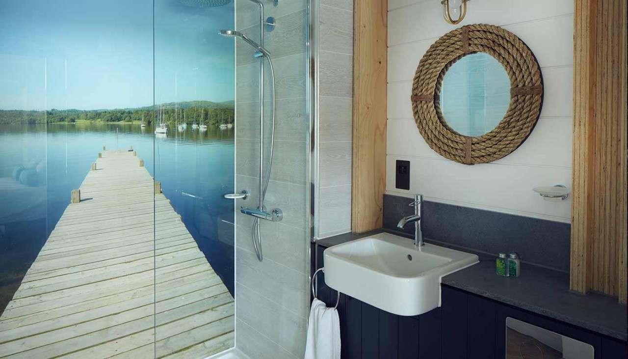 The nautical themed bathroom in a Waterside Lodge