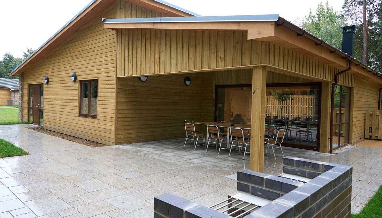 Outdoor patio area with brick built barbecue stand