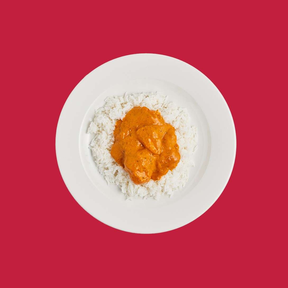 Children's portion of Tikka curry on bed of plain white rice.
