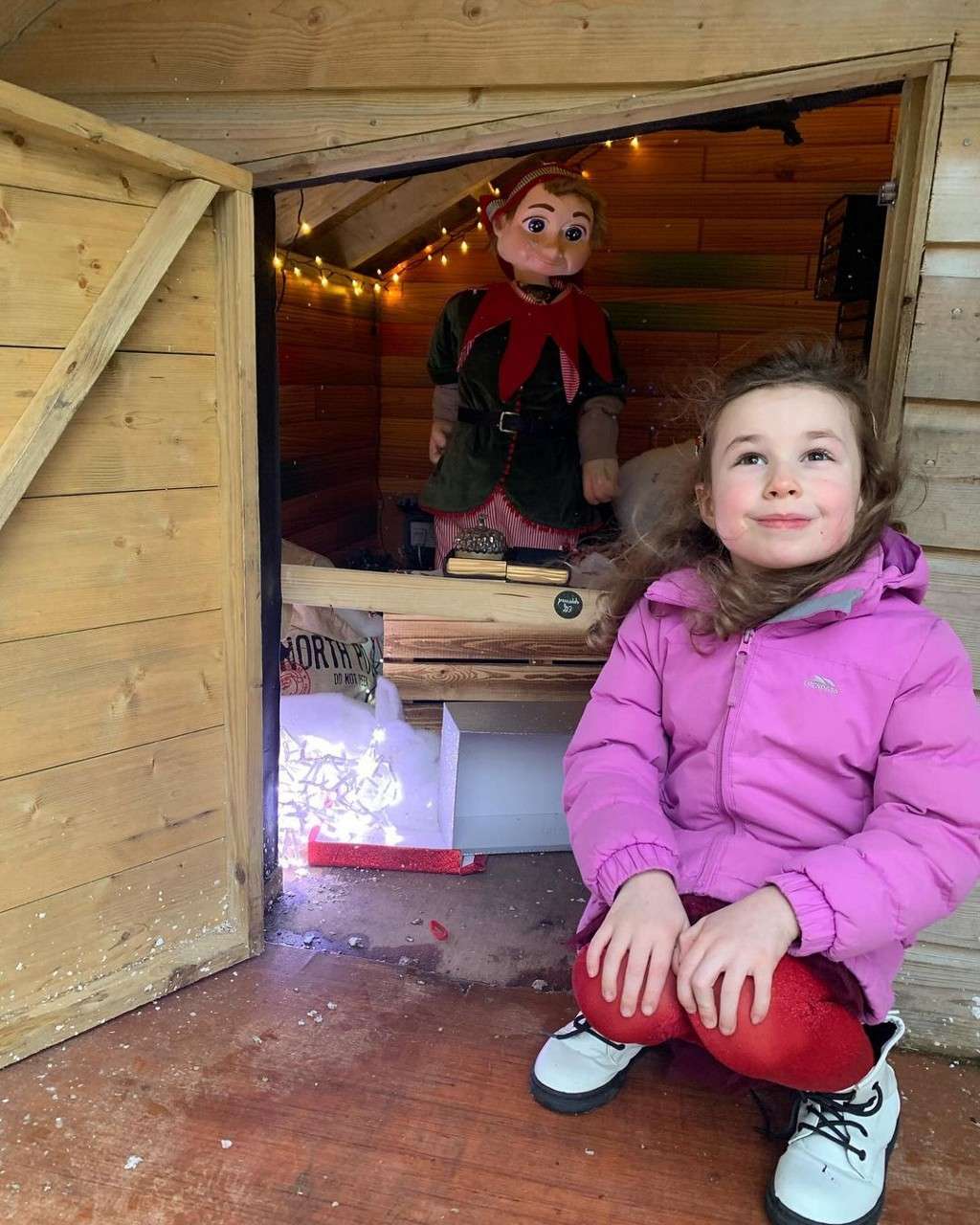 Child visiting an elf during Winter Wonderland