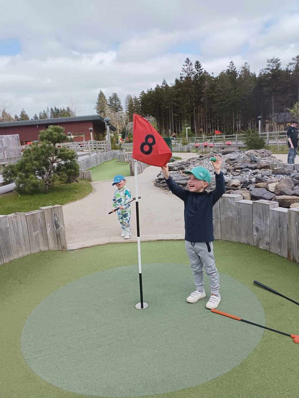 Child celebrating his golf win at Center Parcs