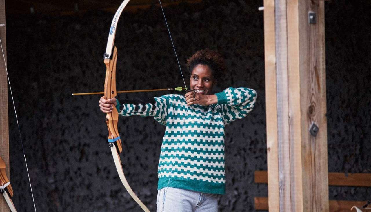 Lady practicing target archery 