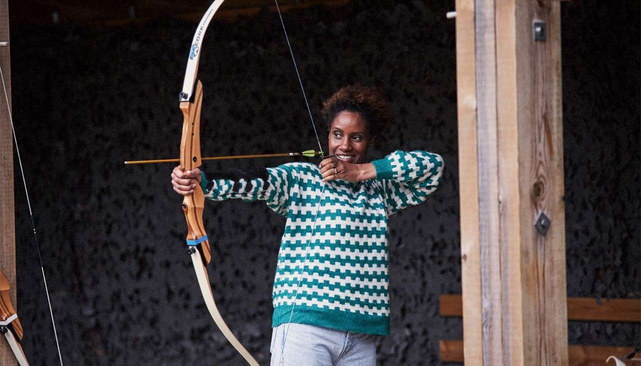 Lady practicing target archery 