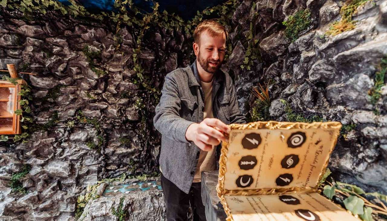 A person opening a book full of clues