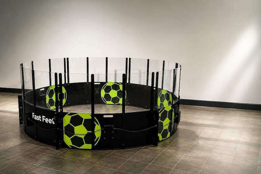 circular arena covered in footballs