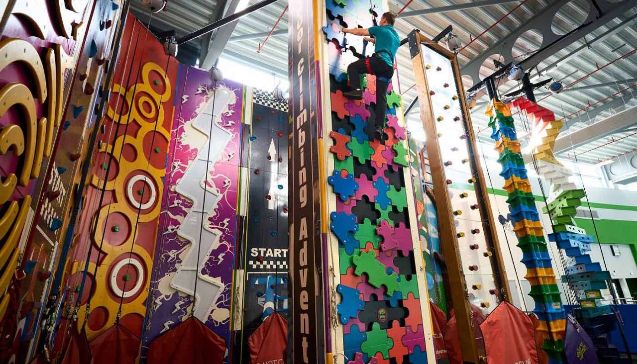 Man climbing an indoor climbing wall