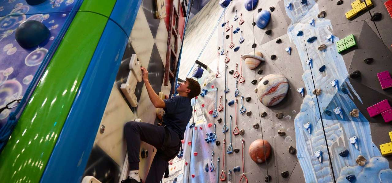 An embedded YouTube video showing the Indoor Climbing Adventure