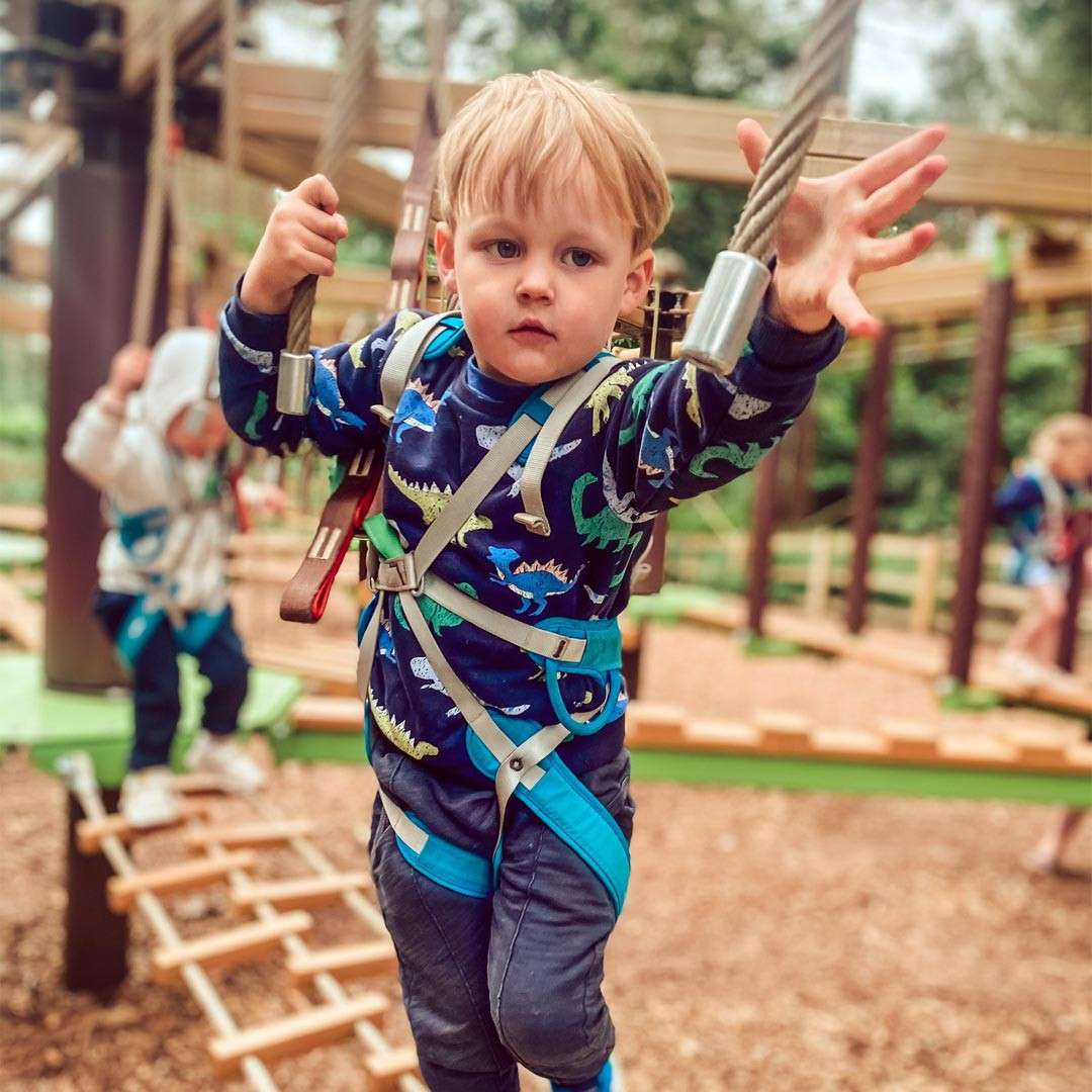 Young boy tackling the Mini Trek course