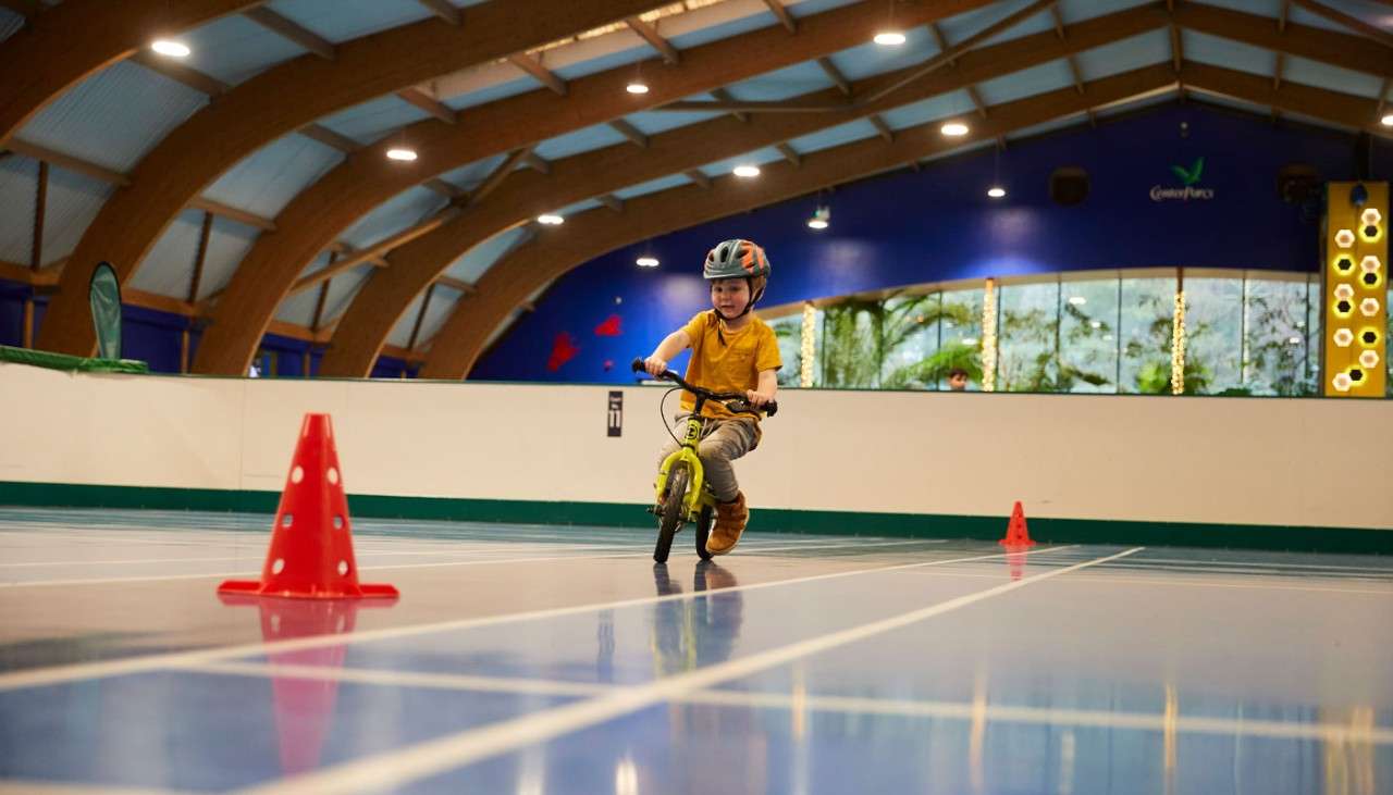 Young child riding on a balance bike