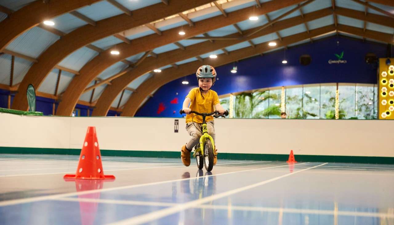 Young child riding on a balance bike