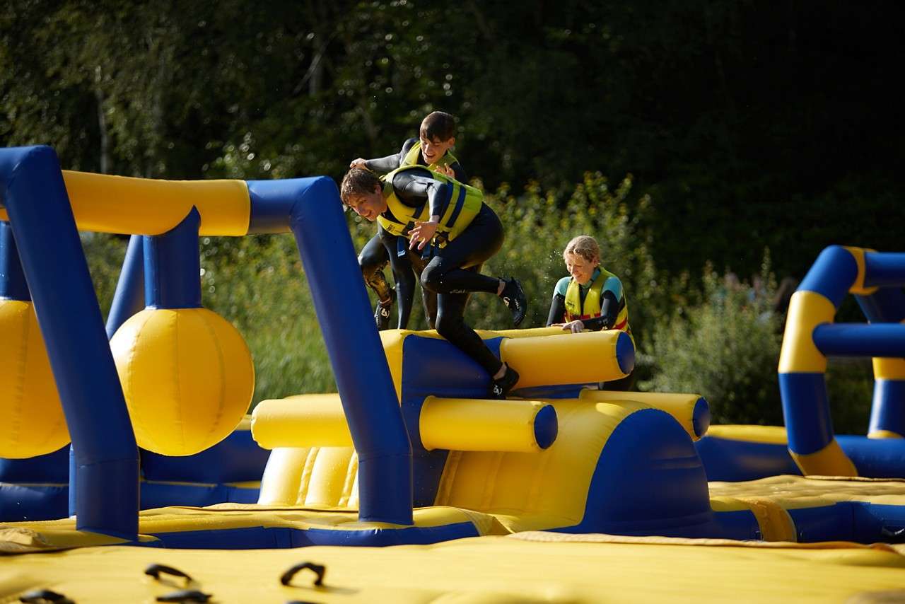 People battling it out on the Aqua Park course