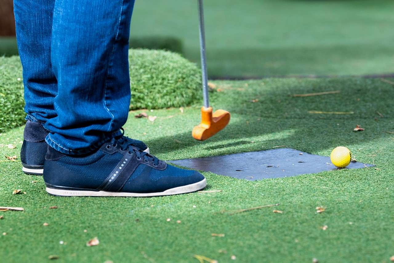 A man stood to take a shot