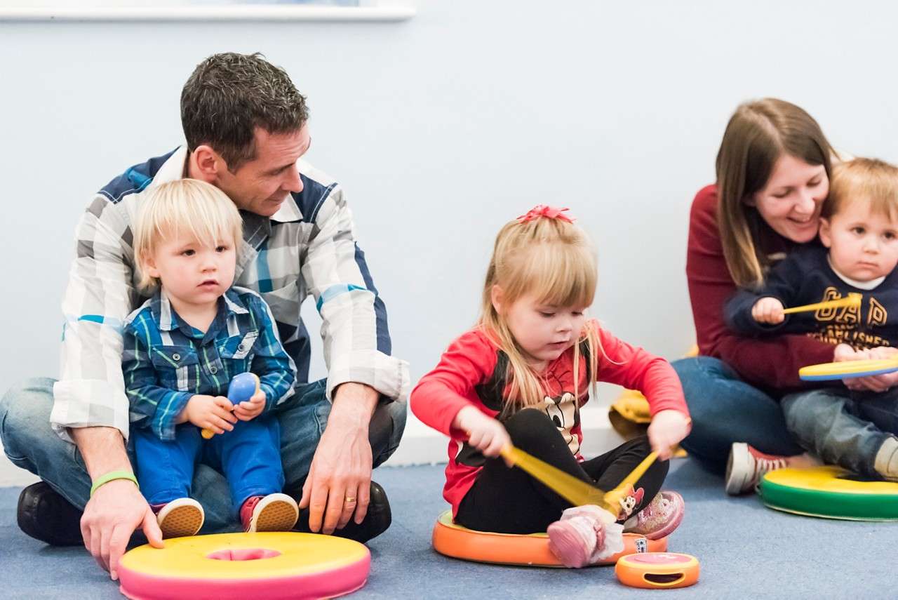 Children banging drums