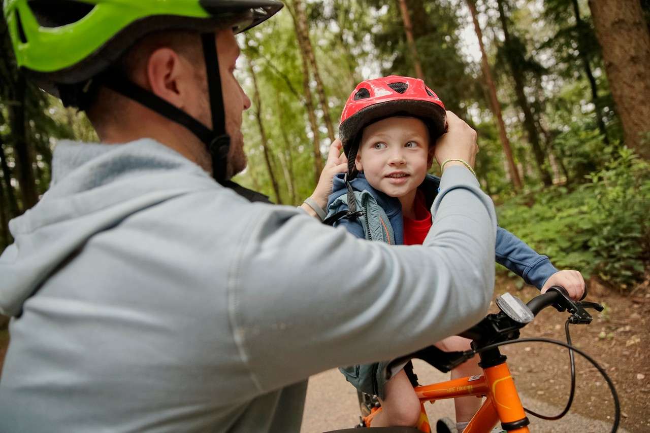 Young boy wearing a helmet.