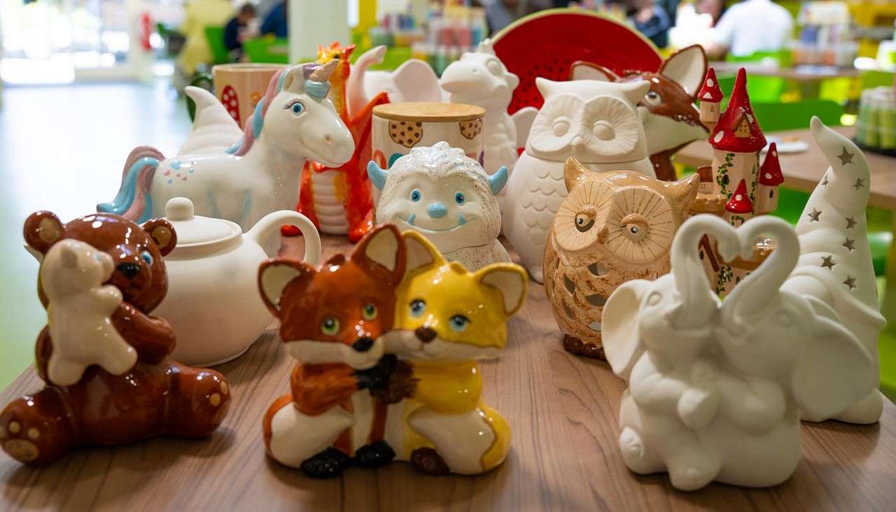 Acollection of pottery including a fox and bear.