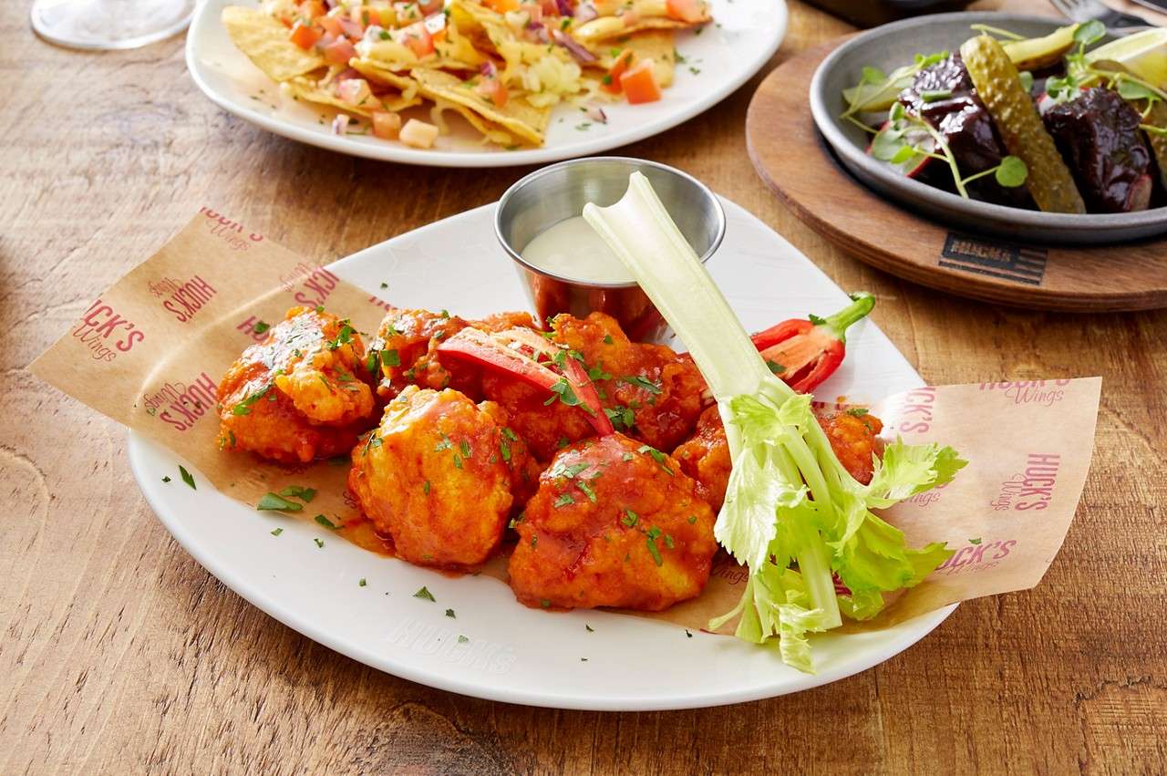 Cauli wings covered in glaze.