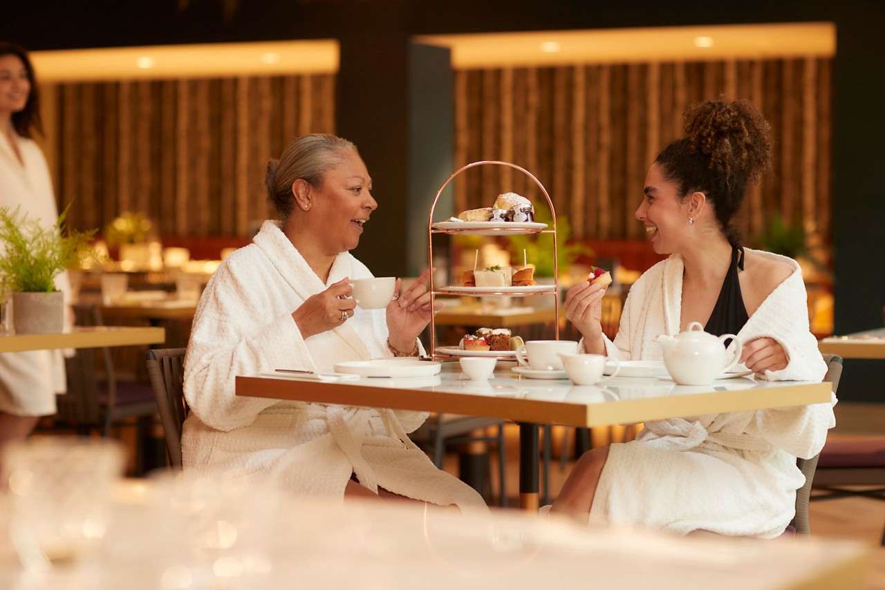 mother and daughter having afternoon tea